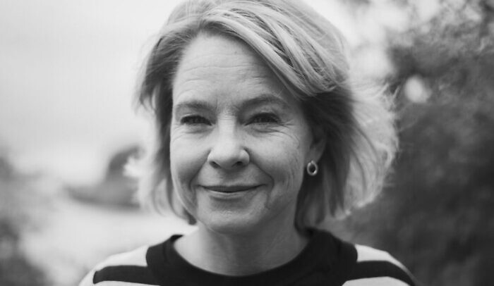 Porträtt av Karin Hubinette. Utökad med AI.